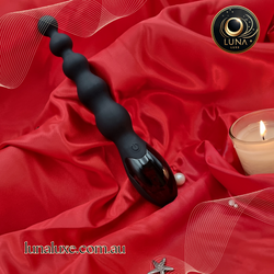 Black dual-motor anal vibrator showing powerful vibrations for prostate massage, available at LunaLuxe Australia.