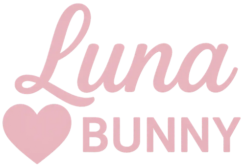 Pink heart-shaped acrylic charm with glittery finish and cursive ’luna bunny’ text.