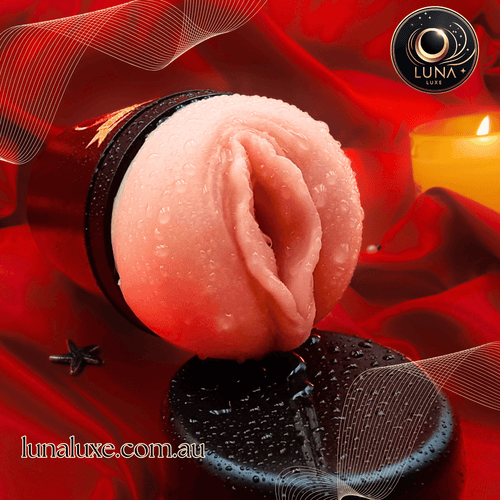 Close-up of the soft, realistic sleeve on red satin—ultra-stretch grip for tight, milky strokes.