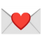 Red heart-shaped sticker on white envelope with gray flap