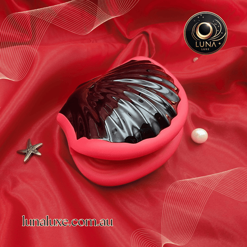 Close-up of the Shell Shock’s ribbed sleeve on red satin—deep, grippy texture for intense pull.