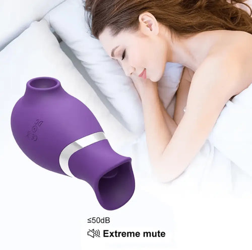 In-bed demo with purple toy—gentle seal over the clitoris for fast, toe-curling release.