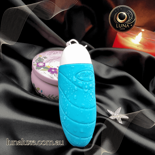 App-controlled vibrator egg on black satin—discreet wearable built for hands-free public play.