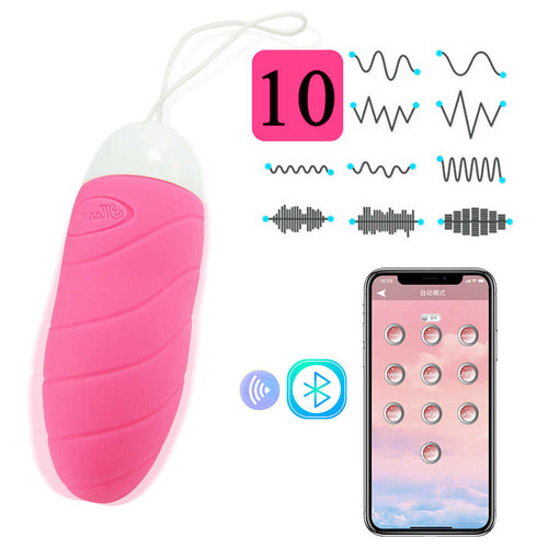 App screen in hand—long-distance control via internet so a partner can play from anywhere.