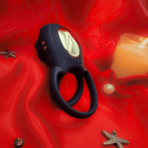Side angle of the rose clitoral stimulator cock ring, showing petal texture and ergonomic ring.