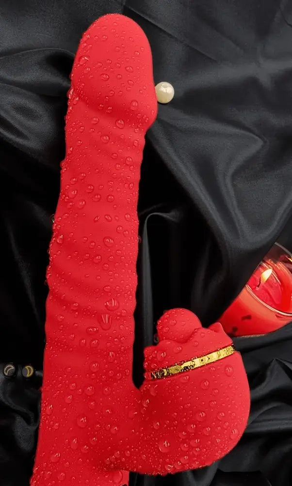 Close side view showing ridged thrusting shaft and flexible external stim for dual pleasure.