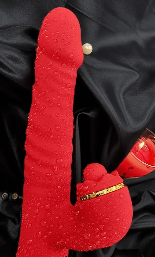 Close side view showing ridged thrusting shaft and flexible external stim for dual pleasure.