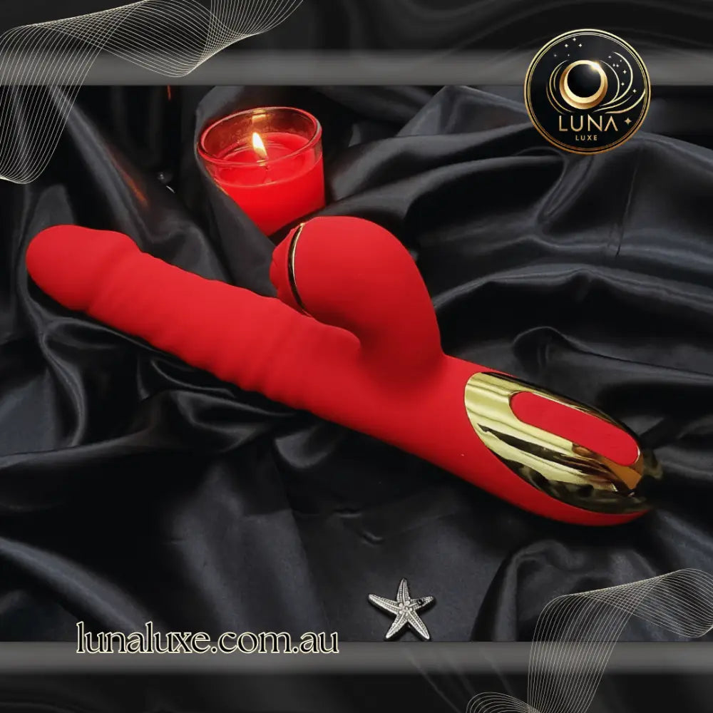 Telescopic rabbit vibrator on black satin—G-spot thrusting shaft with clitoral stim arm.